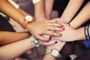 Women of All Colors Joining Hands